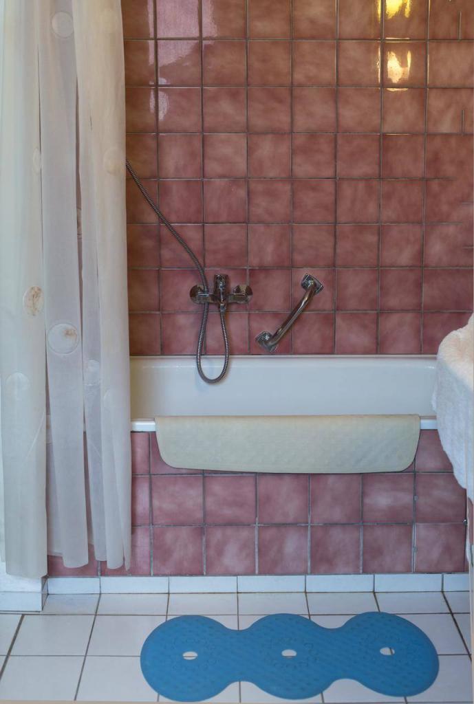 Historisch interieur; anti-slip mat in de badkamer